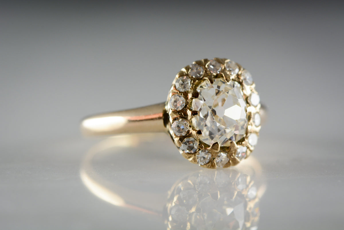 Antique Victorian 18K Rose Gold Engagement Ring with .83 Carat Old Mine Cut diamond and Single Cut Diamond Halo