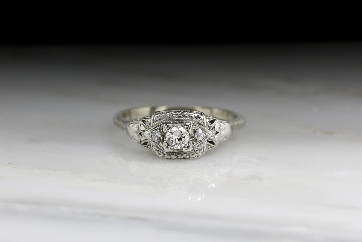Vintage Art Deco Engagement Ring with a Late Transitional Cut Diamond in White Gold with Wheat Pattern Engraving and Open Filigree