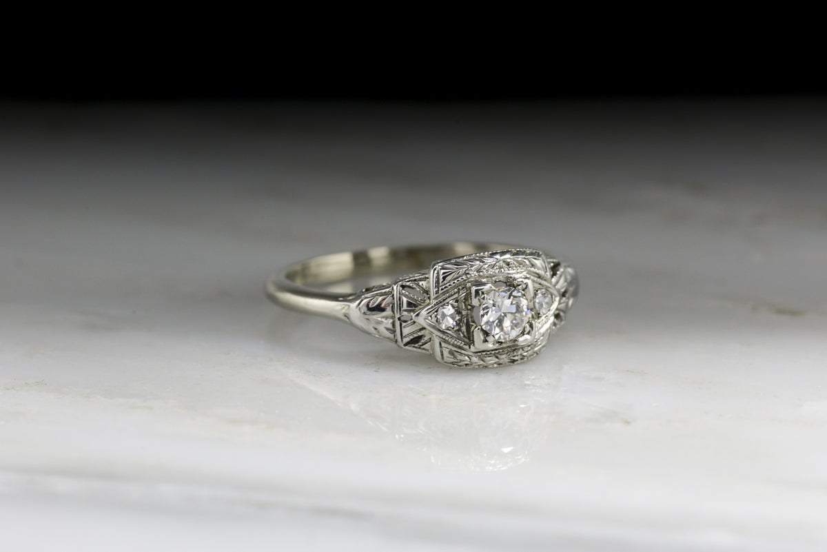 Vintage Art Deco Engagement Ring with a Late Transitional Cut Diamond in White Gold with Wheat Pattern Engraving and Open Filigree