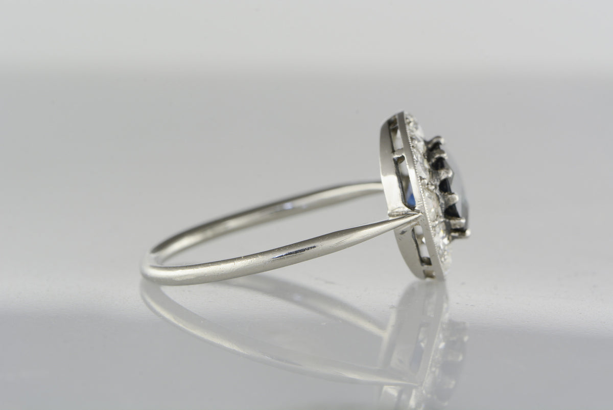 1.50 Carat Natural Sapphire in Art Deco Platinum Ring with Twelve (.84 ctw) Transitional Cut Diamond Halo