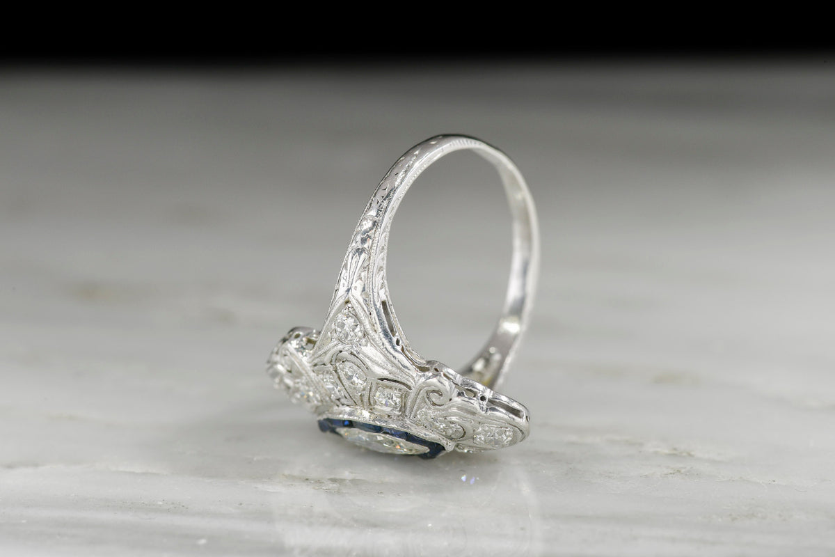Ornate Art Deco Platinum, Diamond, and Sapphire Dinner Ring