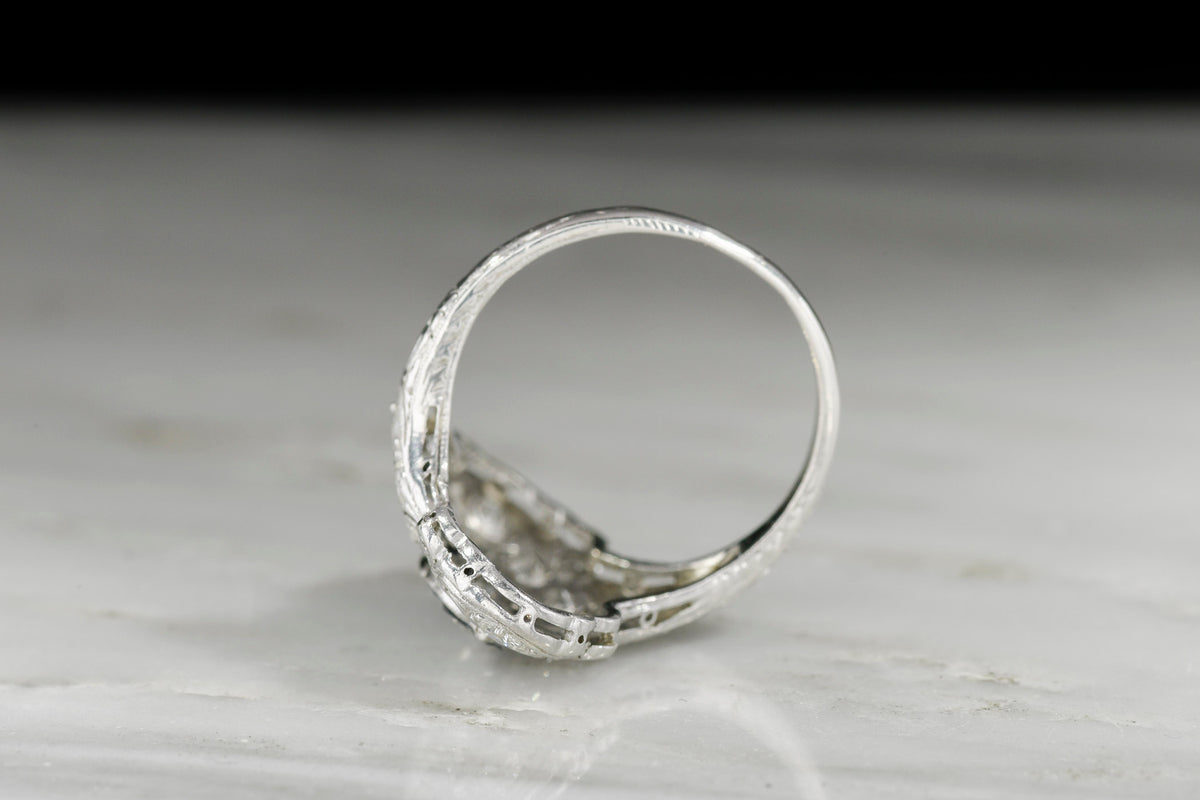 Ornate Art Deco Platinum, Diamond, and Sapphire Dinner Ring