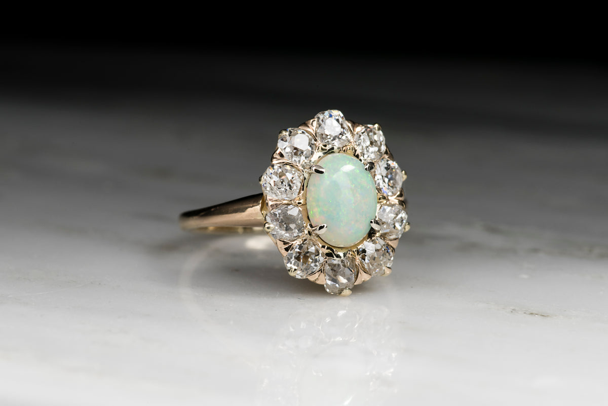 Antique Victorian Cabochon Cut Opal and Old Mine Cut Diamond Cluster Engagement Ring