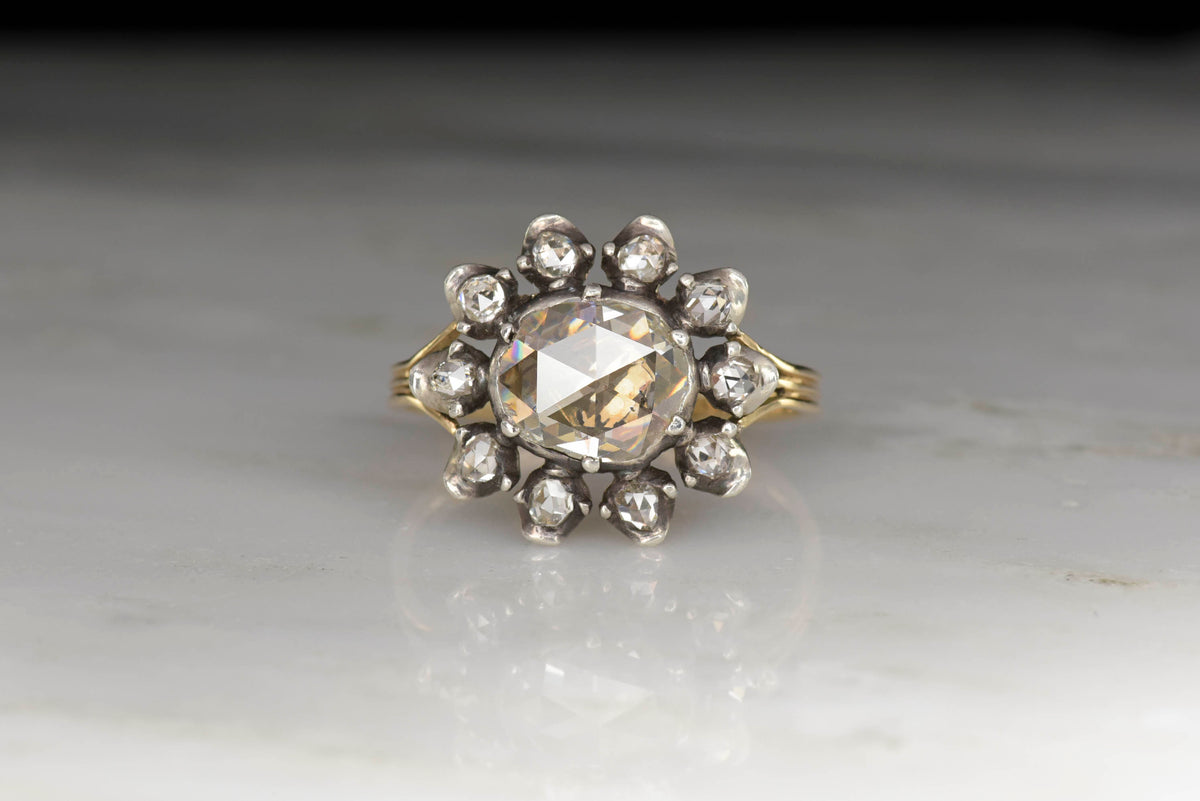 Georgian Antique Rose Cut Diamond and Open Halo Ring in Gold and Silver