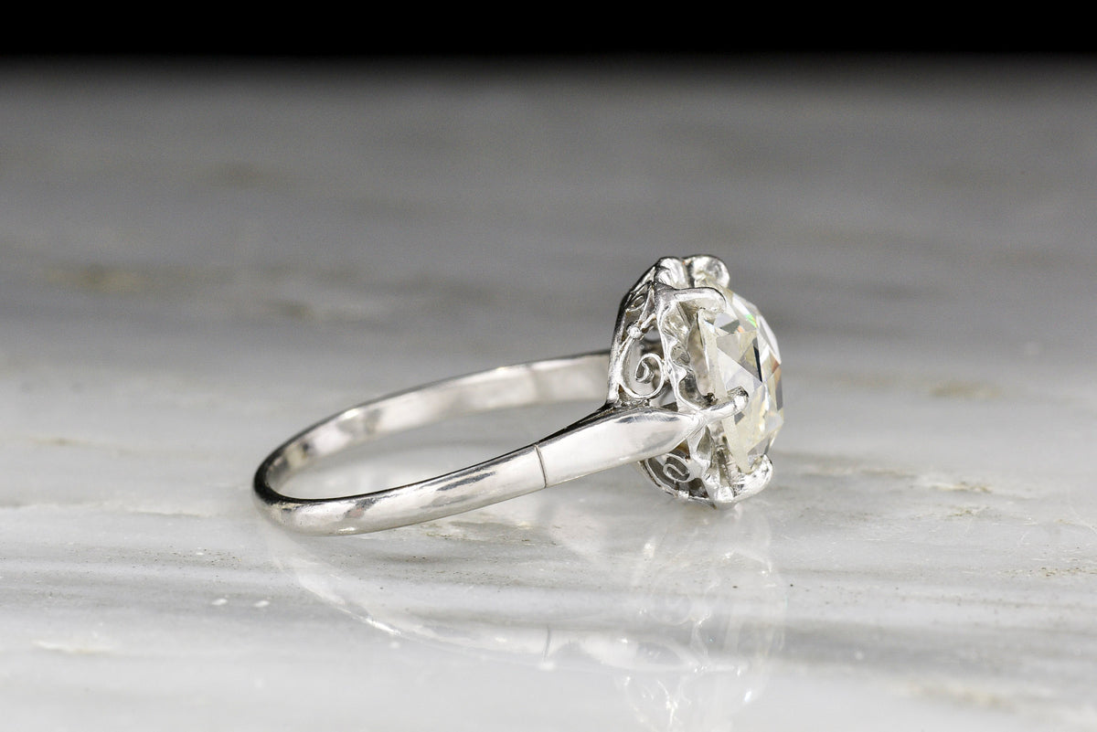 Antique Rose Cut Diamond in an Edwardian Engagement Ring with a Fluted Halo