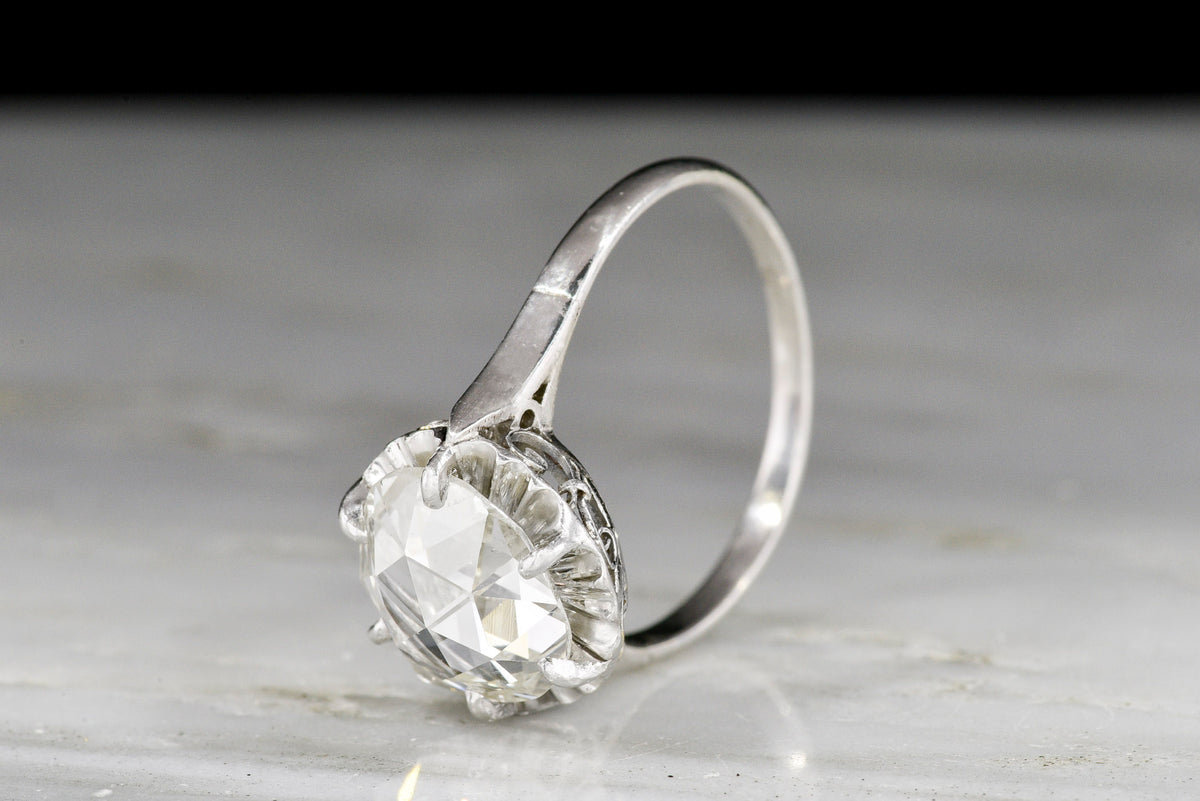 Antique Rose Cut Diamond in an Edwardian Engagement Ring with a Fluted Halo