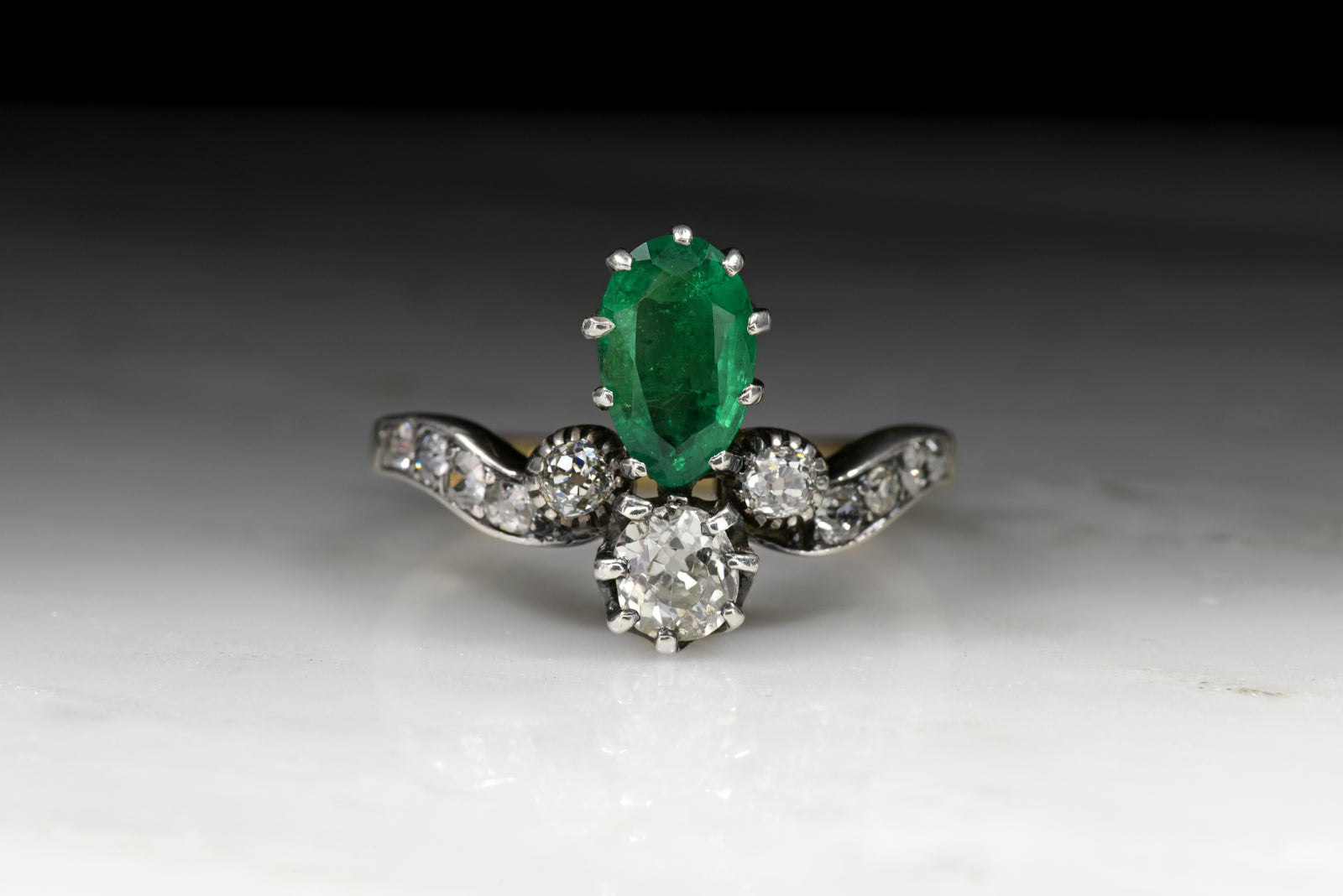 Antique Women's Tiara Ring: Pear Cut Emerald and Old Mine Cut Diamonds