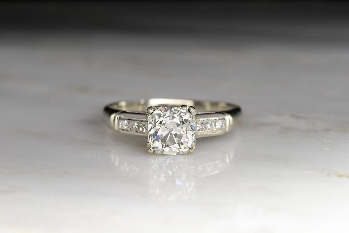 Classic Mid-Century Engagement Ring with an Old Mine Cut Diamond Center