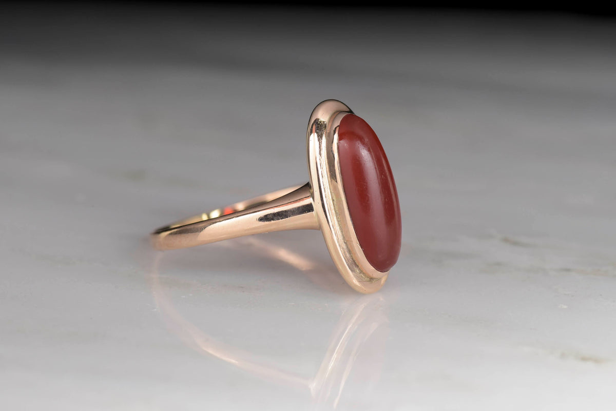 Late Victorian Cabochon Cut Carnelian and Rose Gold Ring