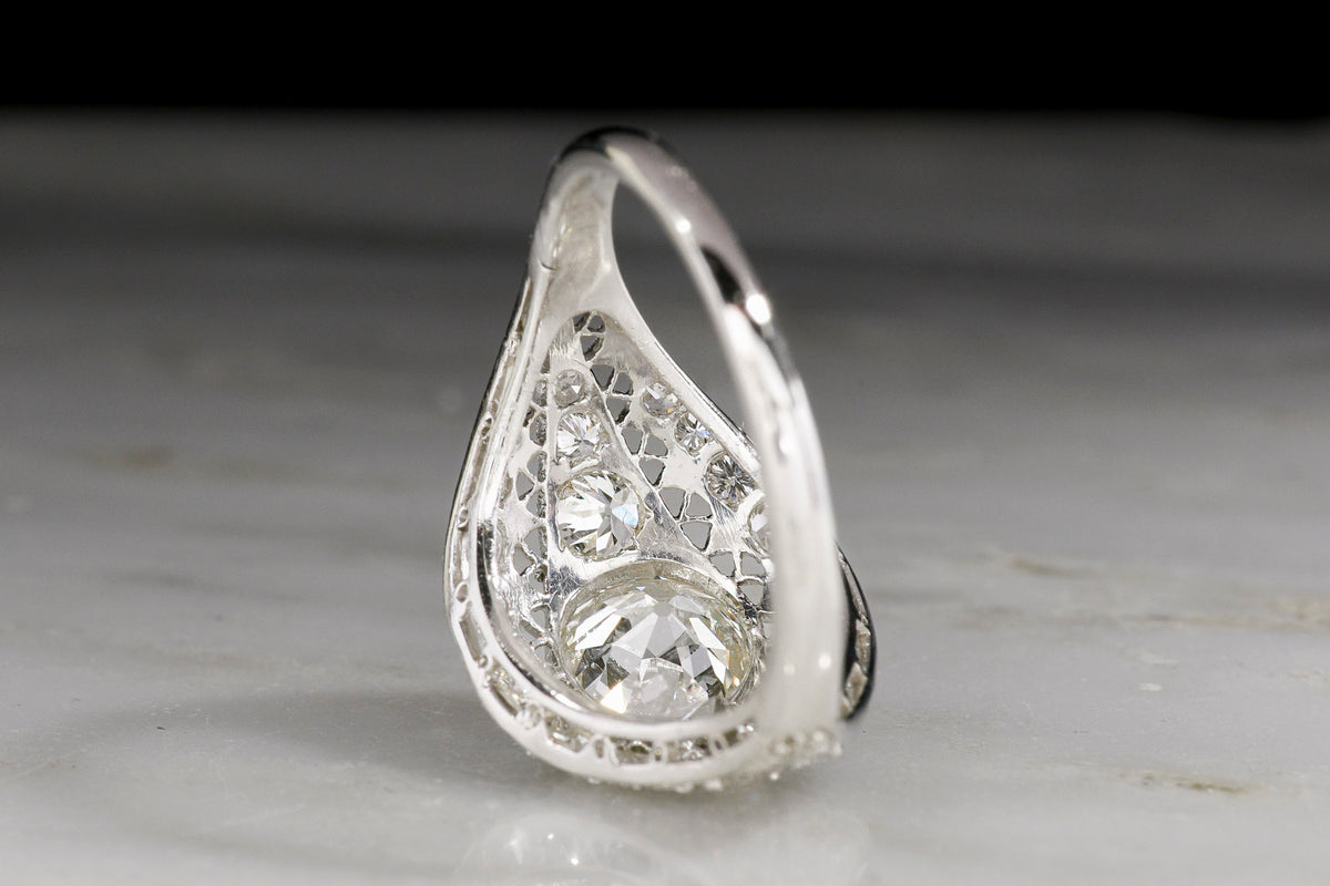 Late Edwardian / Art Deco Platinum and Diamond Dinner Ring; 1.01 Carat Old European Cut Diamond Center