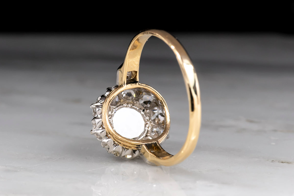 Late Victorian/Early Edwardian Rose Cut and Old Mine Cut Diamond Cluster Ring in Gold and Platinum