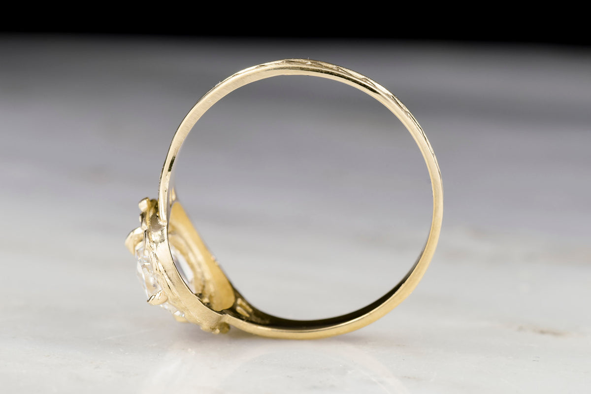 Victorian Revival / Neoclassical Gold Engagement or Right-Hand Ring with an Oval Rose Cut Diamond Center