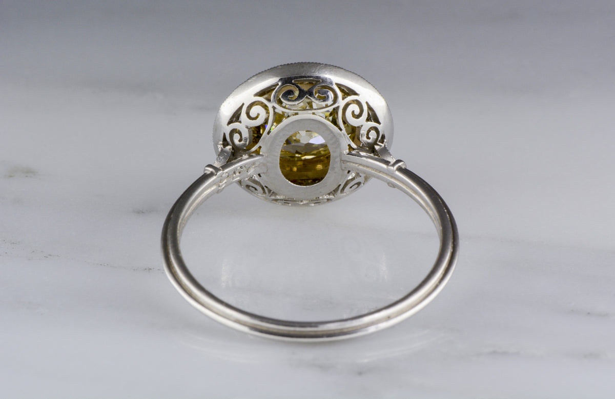 1.36 Carat Fancy Light Yellow Old European Cut Diamond in Art Deco Platinum Engagement Ring with .35 ctw Diamond Accents